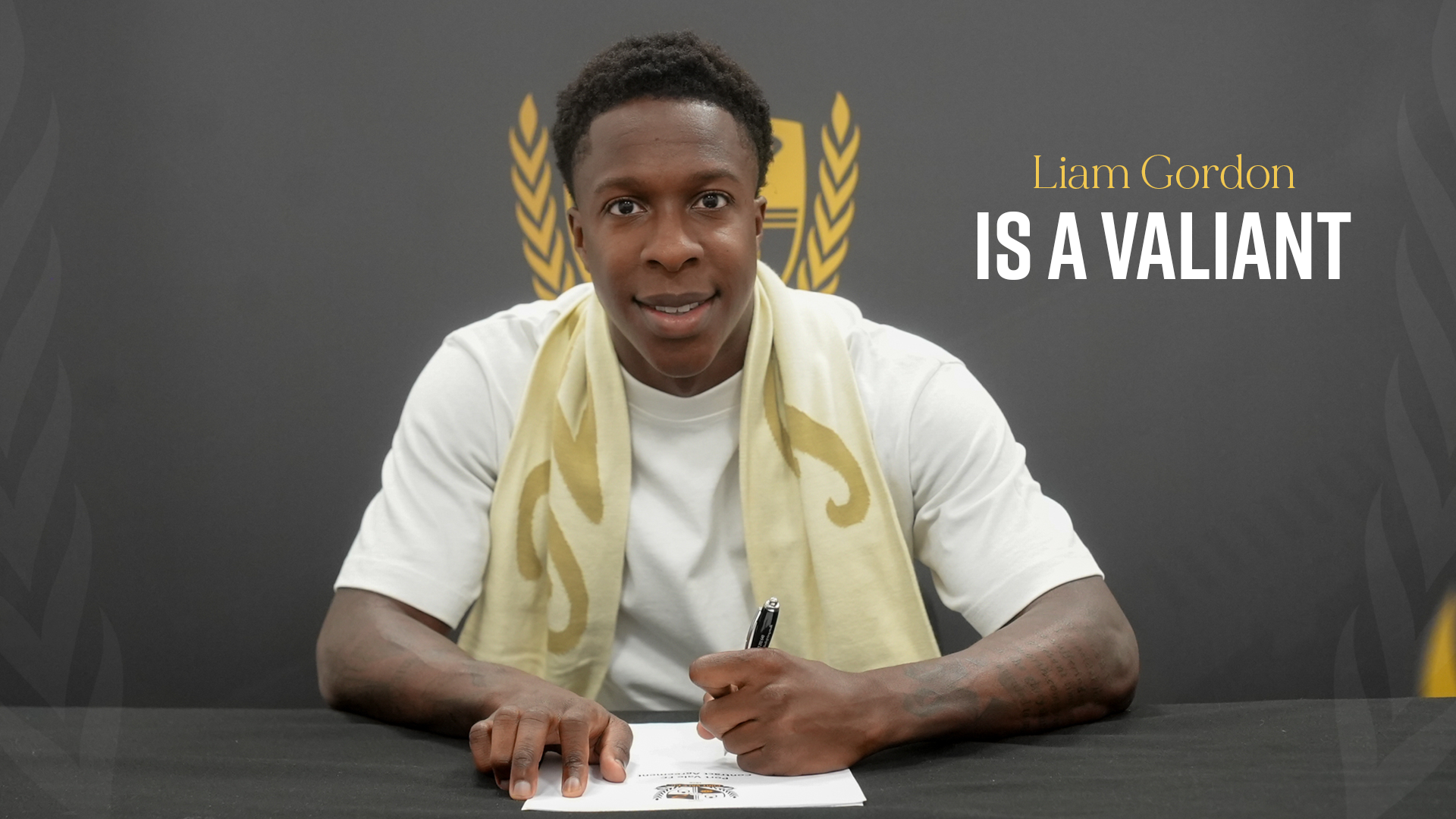 Liam Gordon signs