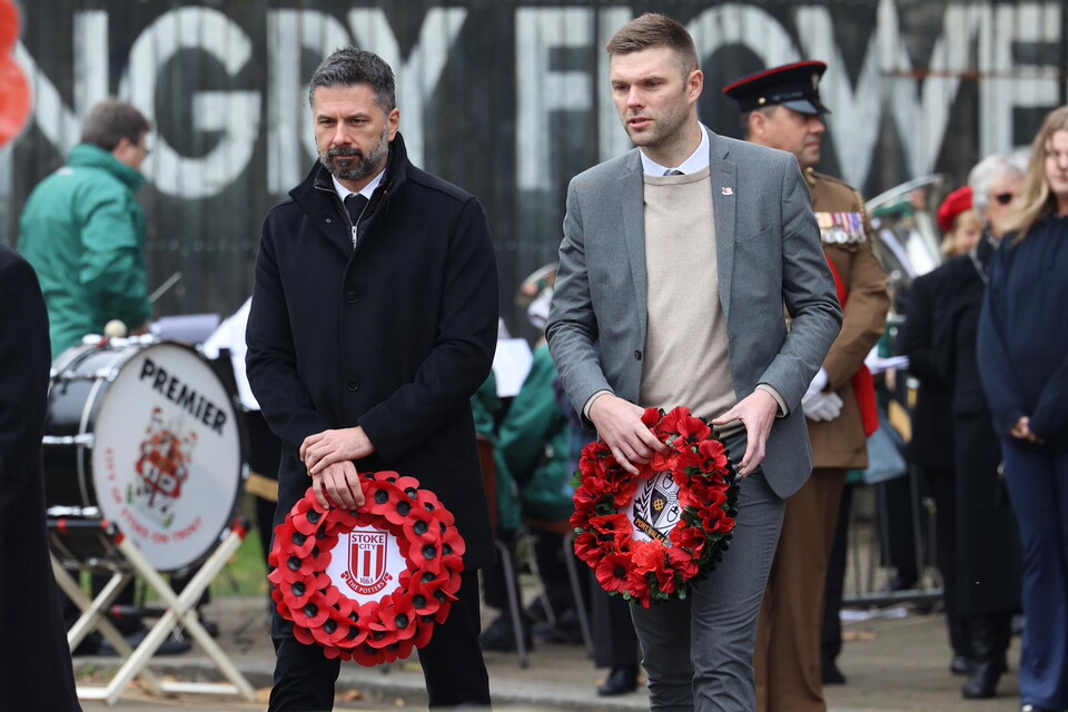 Port Vale's Matt Hancock stood with Stoke City's Simon King